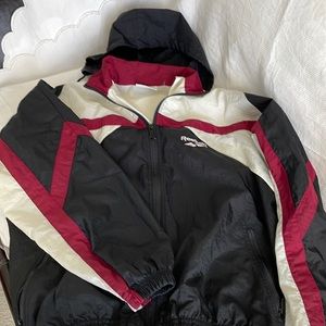 Reebok windbreaker jacket with mesh venting across back